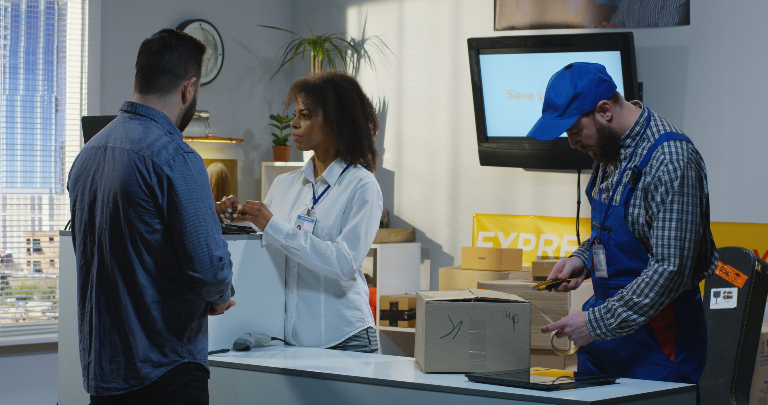 Customer sending a package at a delivery center