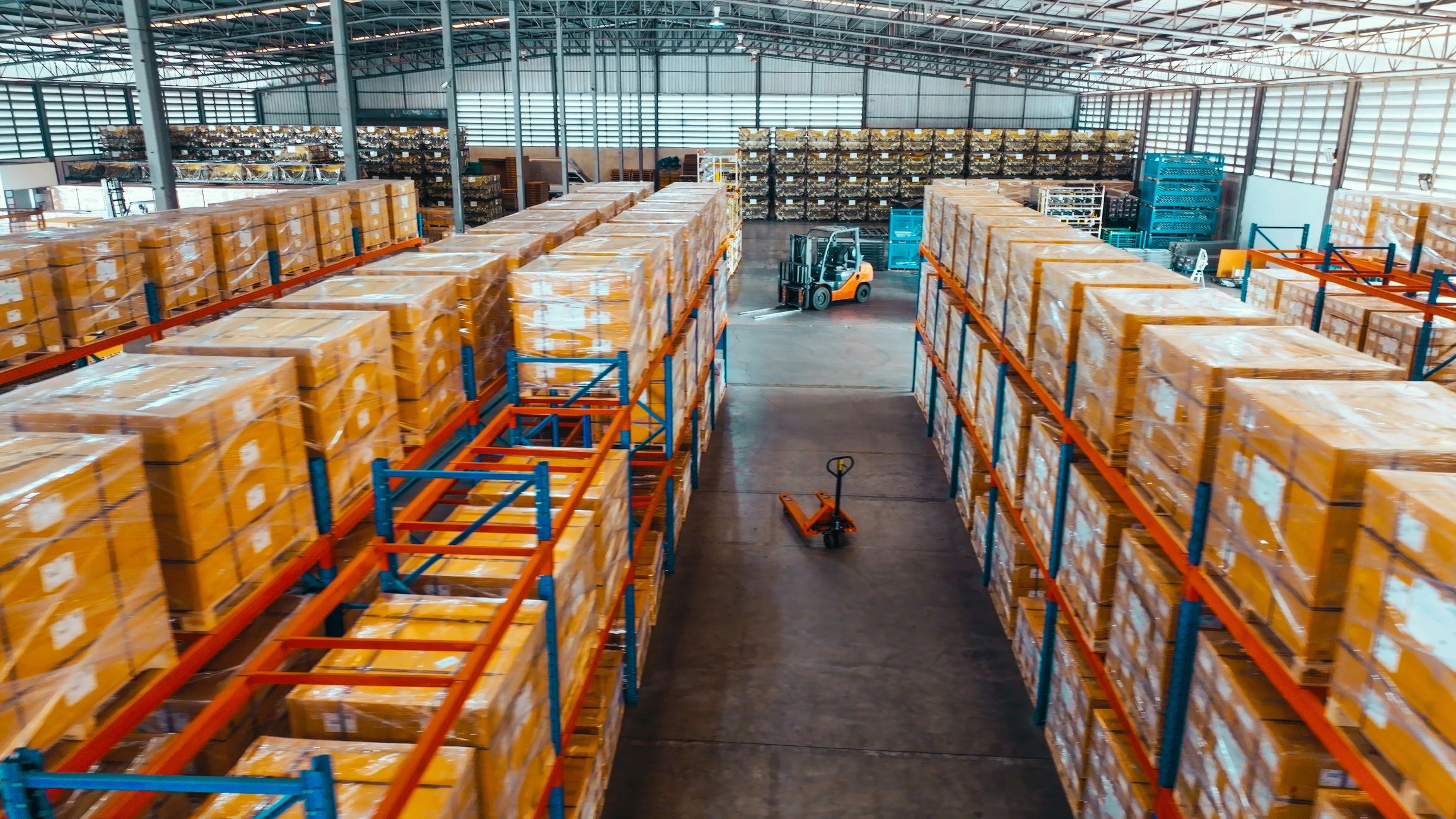 Warehouse shelves with organized parcels ready for distribution