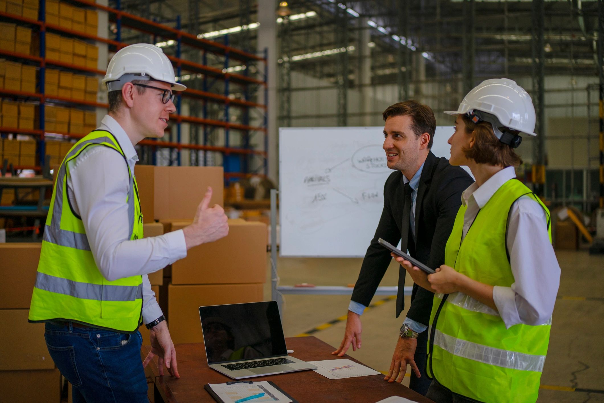 Warehouse team meeting in a logistics facility