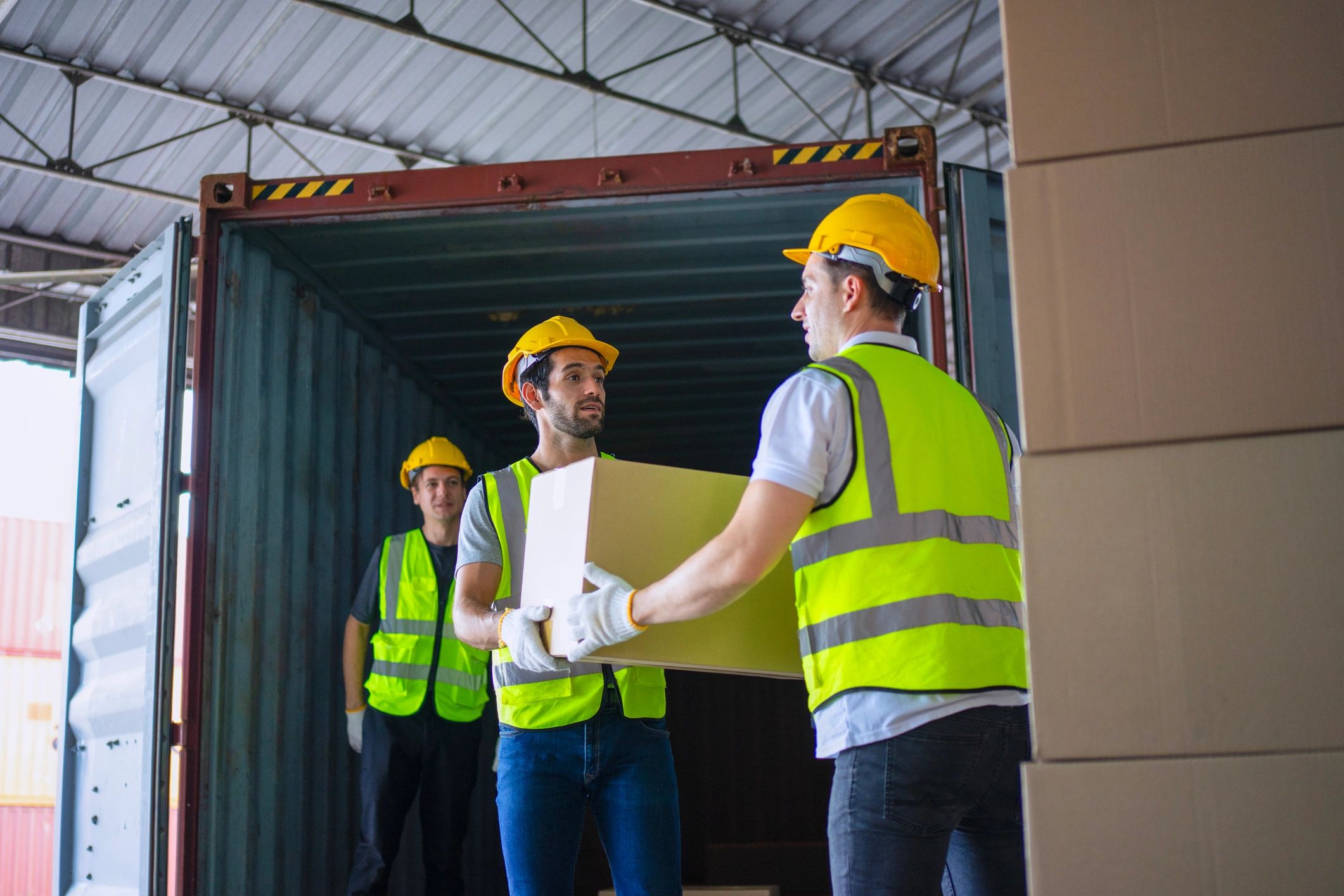 Courier warehouse staff working in a logistics center